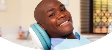 Man with healthy smile after preventive dentistry appointment