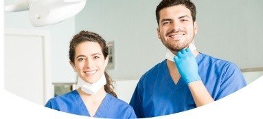 Smiling dental team members