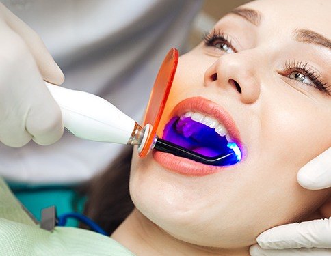 Patient receiving dental bonding