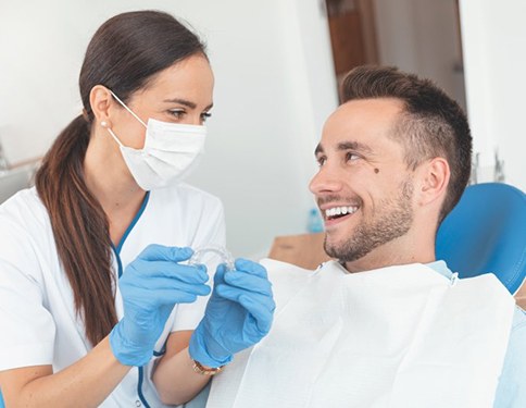 Patient and Tyler dentist discuss Invisalign in Tyler