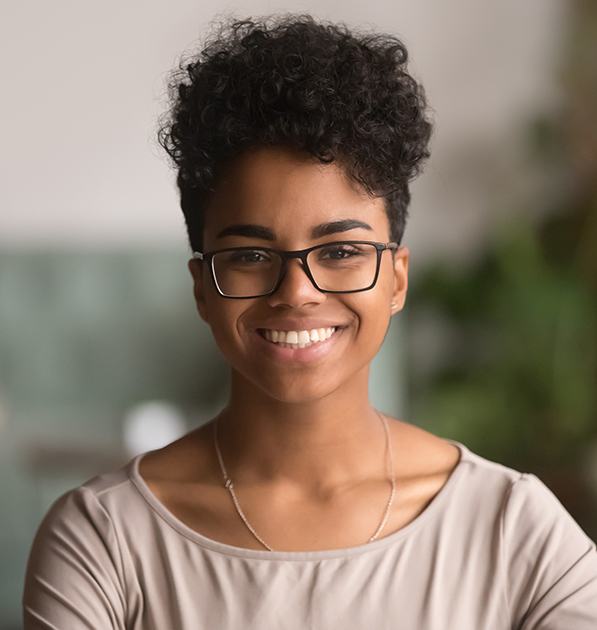 Young woman with straight smile after Invisalign