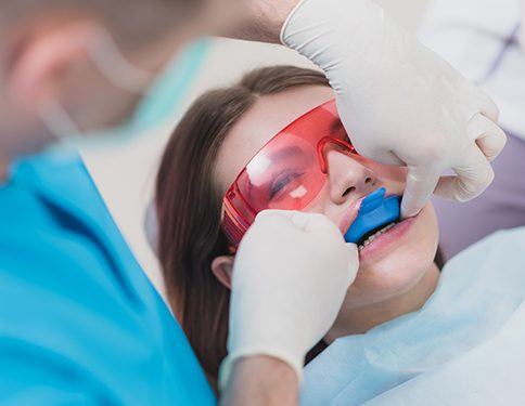 Patient receiving fluoride treatment