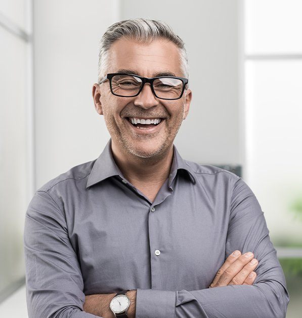 Smiling man after root canal therapy