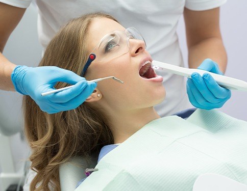 Dentist capturing intraoral images