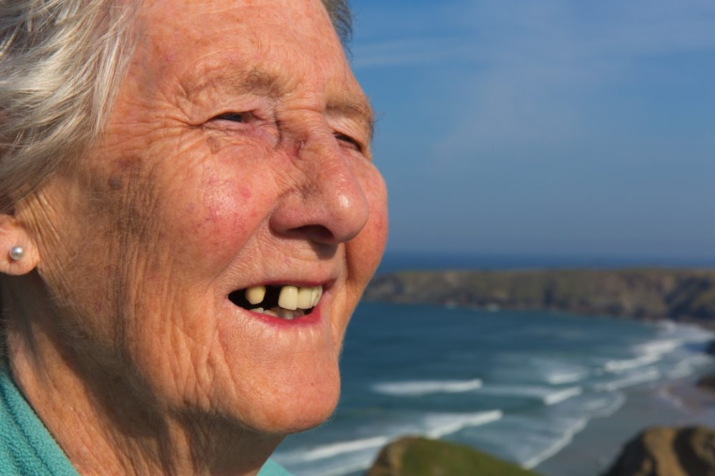Older woman missing teeth