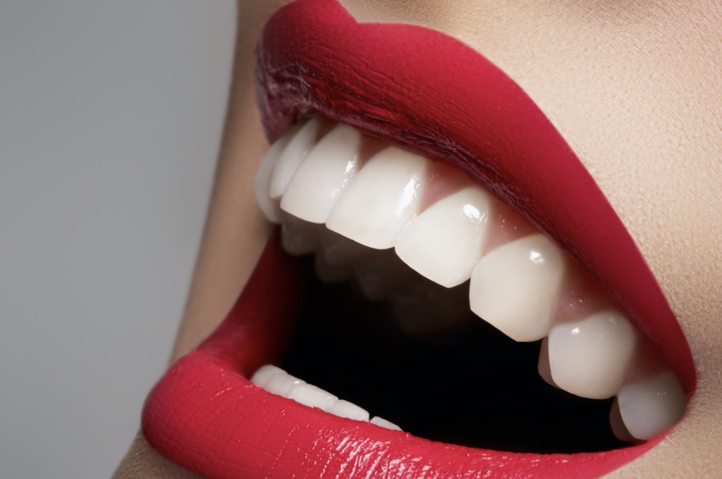 red lips and white teeth